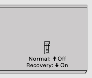 Interruptor Normal/Recovery en la parte trasera de la unidad